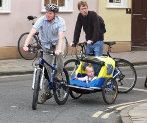 One way to bring your kids with you! (Via cyclinginfo.co.uk)